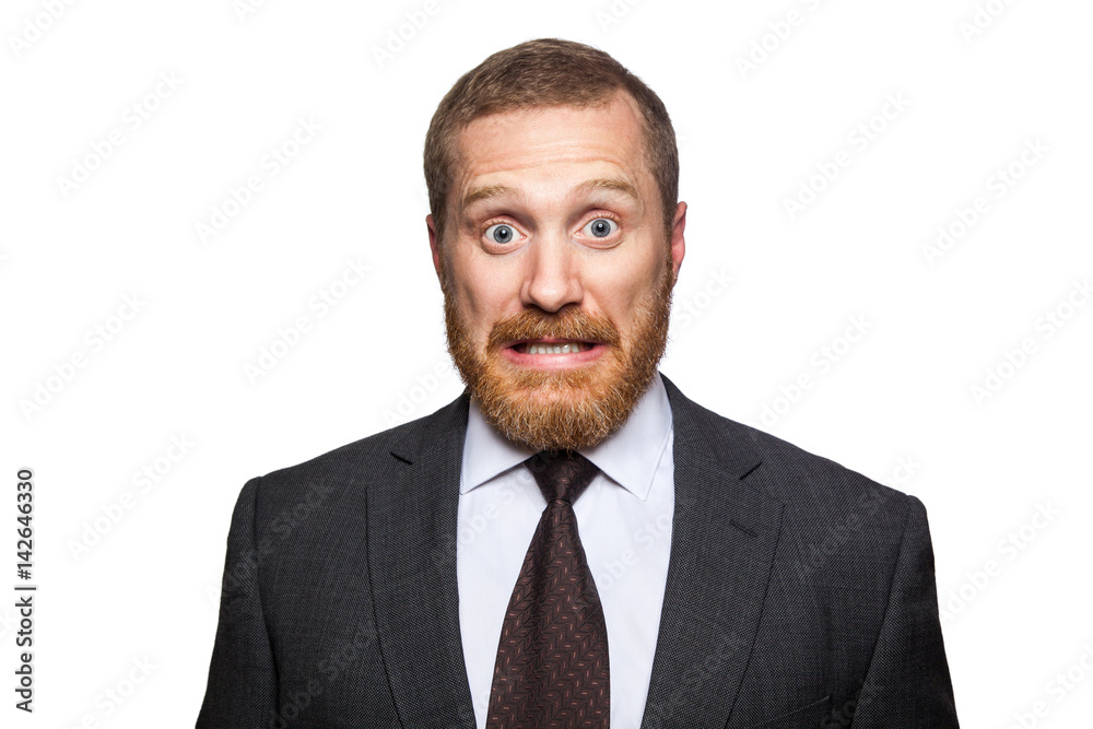 Shocked surprised businessman looking at camera with big eyes. isolated on white, looking at camera. Shocked surprised businessman looking at camera with big eyes. isolated on white, looking at camera.