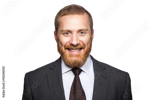 Happy smilely businessman looking at camera with toothy smile. isolated on white, looking at camera.