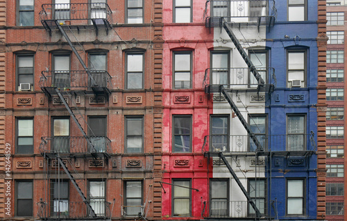 Manhattan, old apartment buildings with external fire escape ladders
