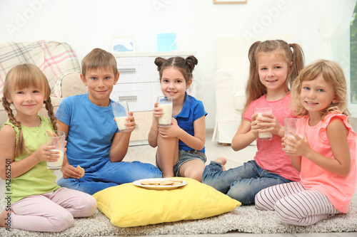 Little children eating cook...