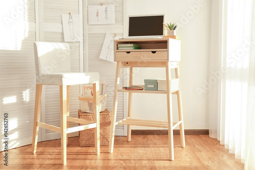 High wooden table as stand ...