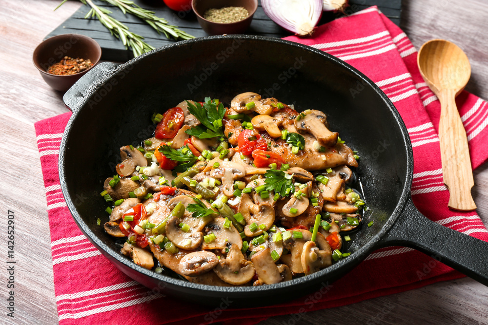 Tasty chicken marsala on pan on table Tasty chicken marsala on pan on table