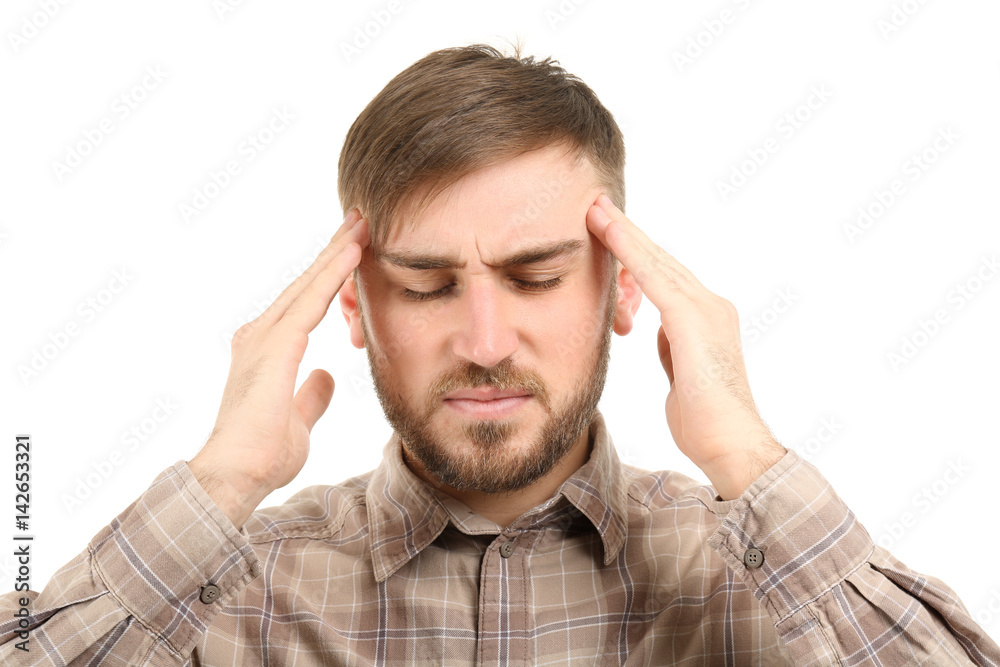 Young man suffering from headache on white background Young man suffering from headache on white background