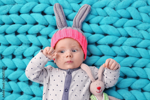 Cute little baby in bunny h...