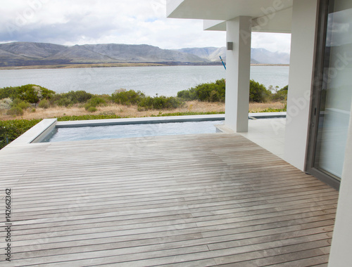 External view of a contemporary house with pool at dusk