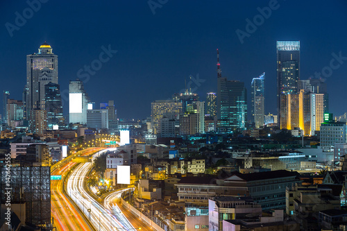 Highway and skyline  with white billboard in business zone or do