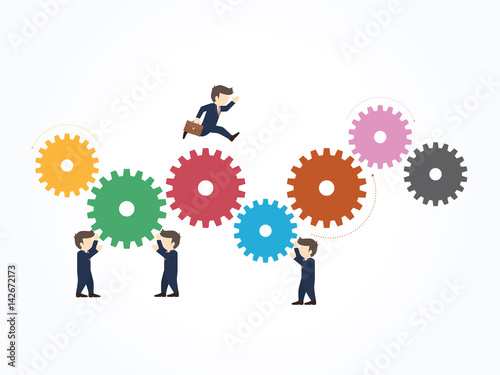 Businessman running on gear