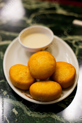 Fried buns and sweetened condensed milk