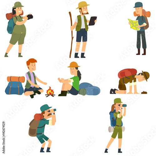 People with backpacks are hiking.