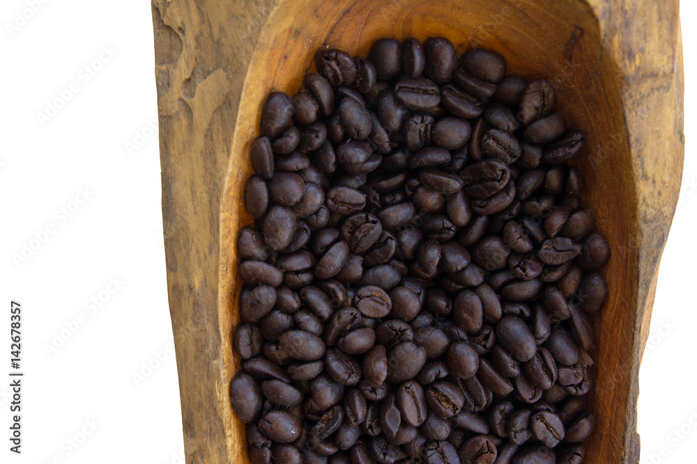 Fototapeta premium coffee beans in a wooden bowls, close up, horizontal