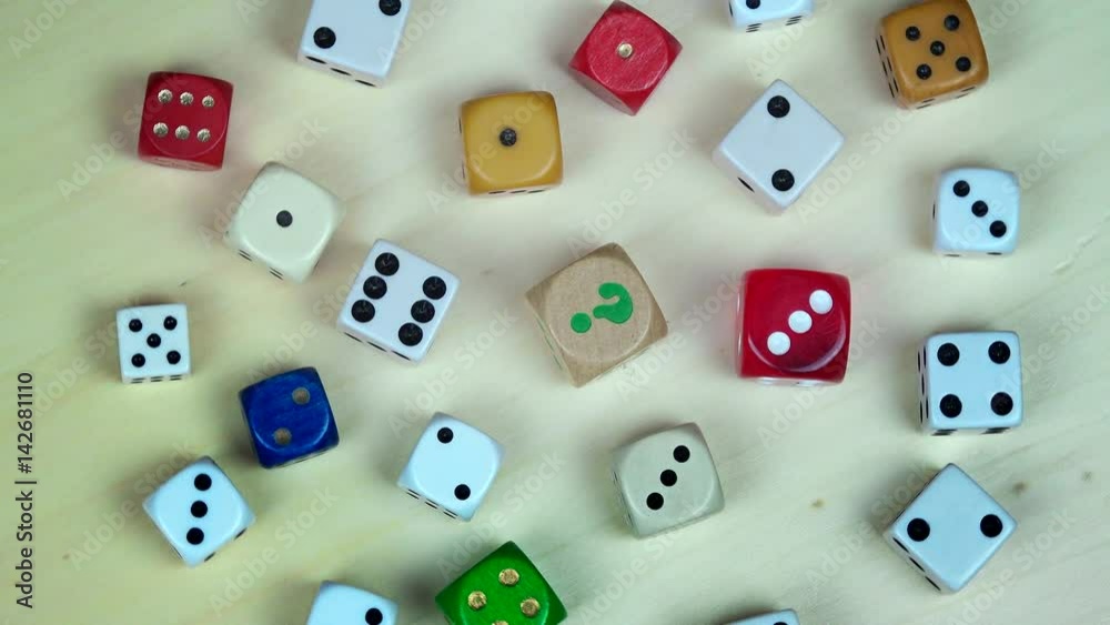 Colorful dices on wooden background. turntable Colorful dices on wooden background. turntable