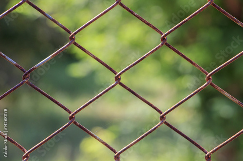 Old metal wire fence (selectived focus)