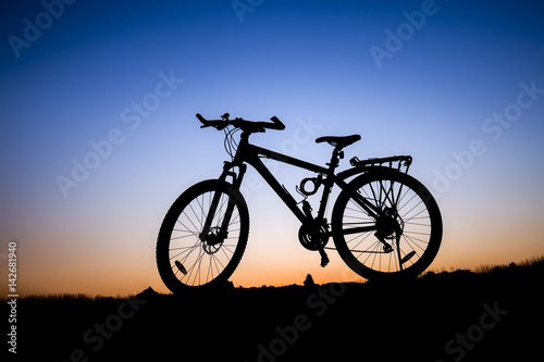 The silhouette of mountain bike