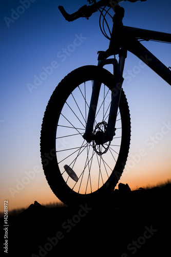 The silhouette of mountain bike