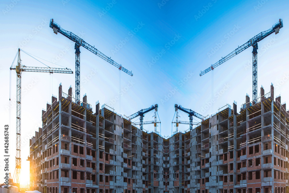 Panorama of construction at the background of blue sky