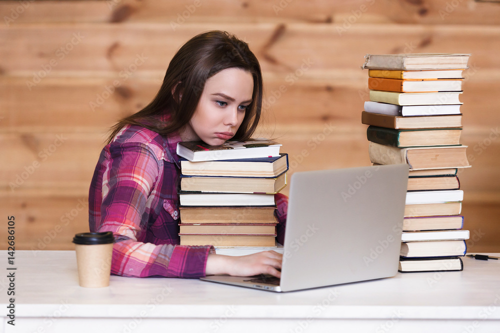 Young african american woman student tired of working and studying