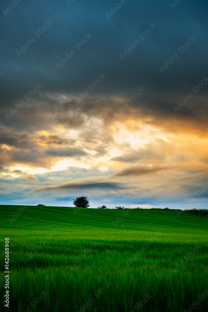 Sun setting over a landscape in Scotland Sun setting over a landscape in Scotland