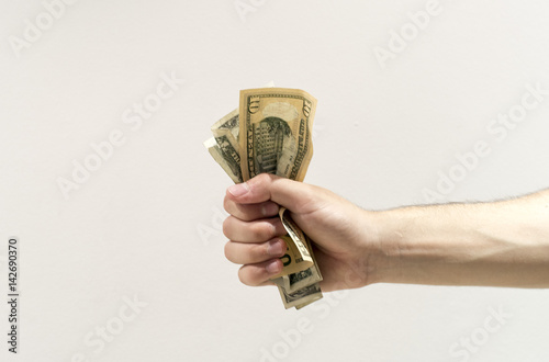 Dinero en la mano