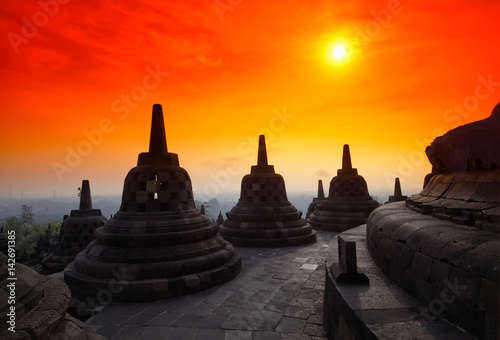 Stupas at the top level of the temple of Borobudur on the island of Java