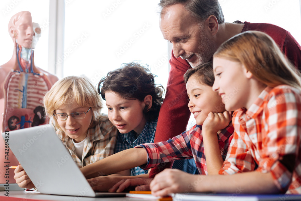 Active persistent students watching videos in class Active persistent students watching videos in class
