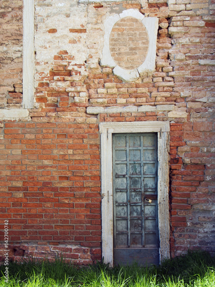 ancient brick wall with doorway