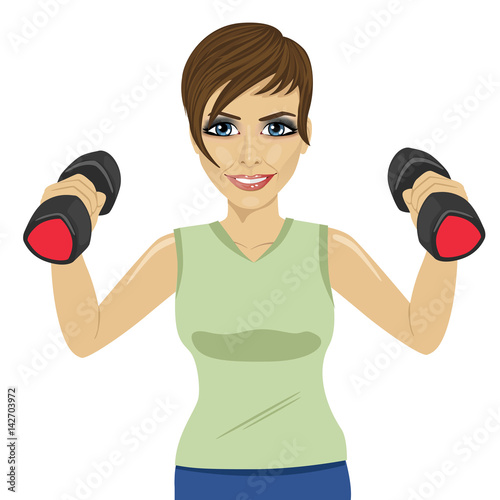 Young woman doing exercises with dumbbells