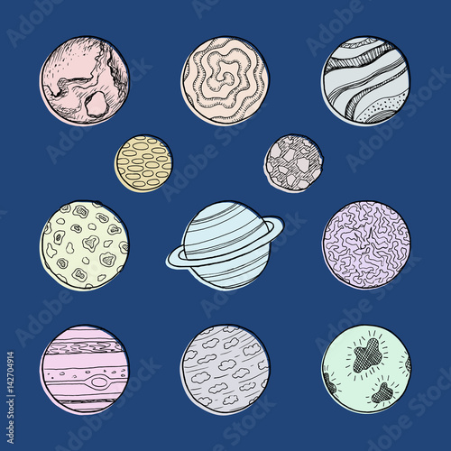 Set of hand drawn doodle planets with different textures. Sketch space illustration.