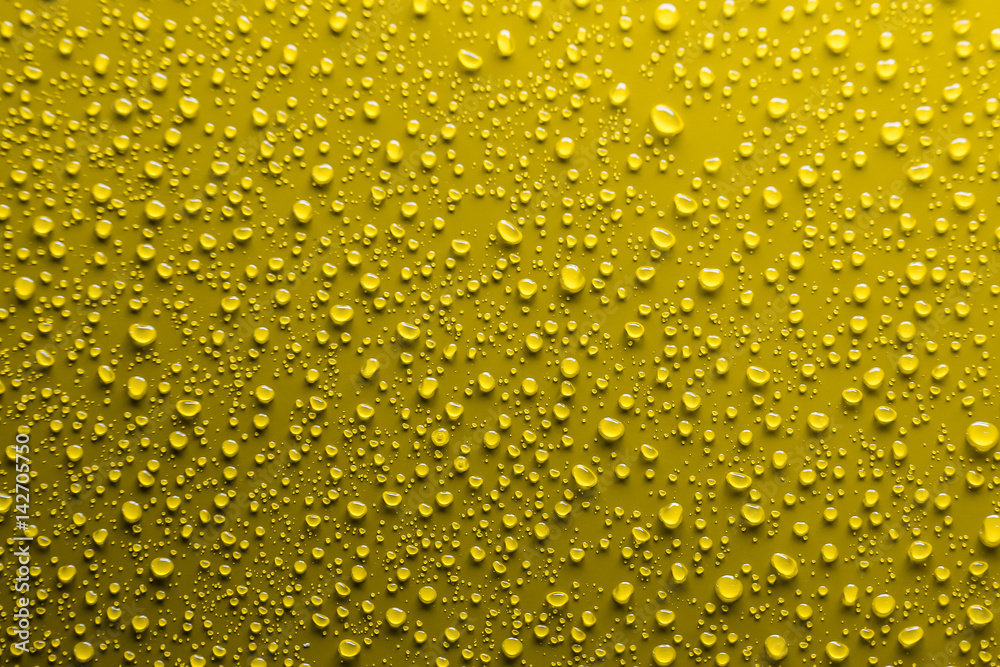 Water drops on yellow
