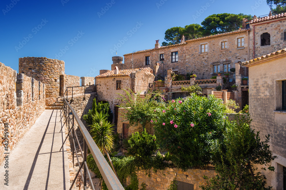 Sunny view of ancient fortress Tossa de Mar, Girona province, Spain.