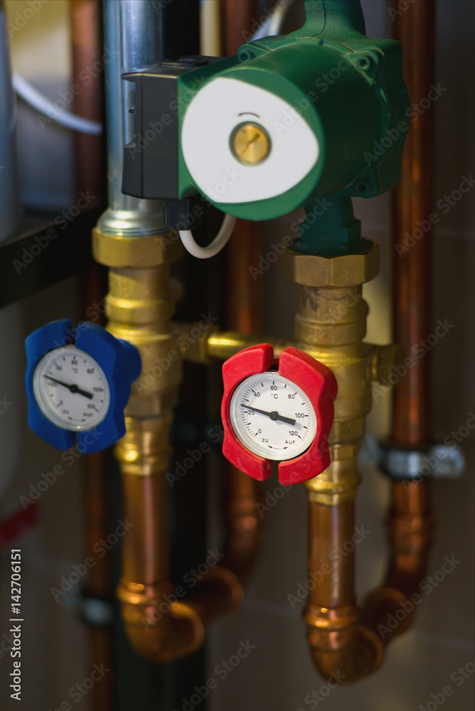 The pump and temperature indicators for hot water circulation in domestic water supply system The pump and temperature indicators for hot water circulation in domestic water supply system