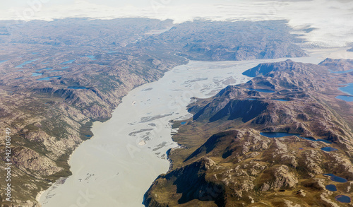 Fjord appearing on the ice dome of Iceland in the area between Narsarsuaq and Frederikshab. This is a consequence of the phenomenon of global warming and catastrophic thawing of ice, Greenland photo