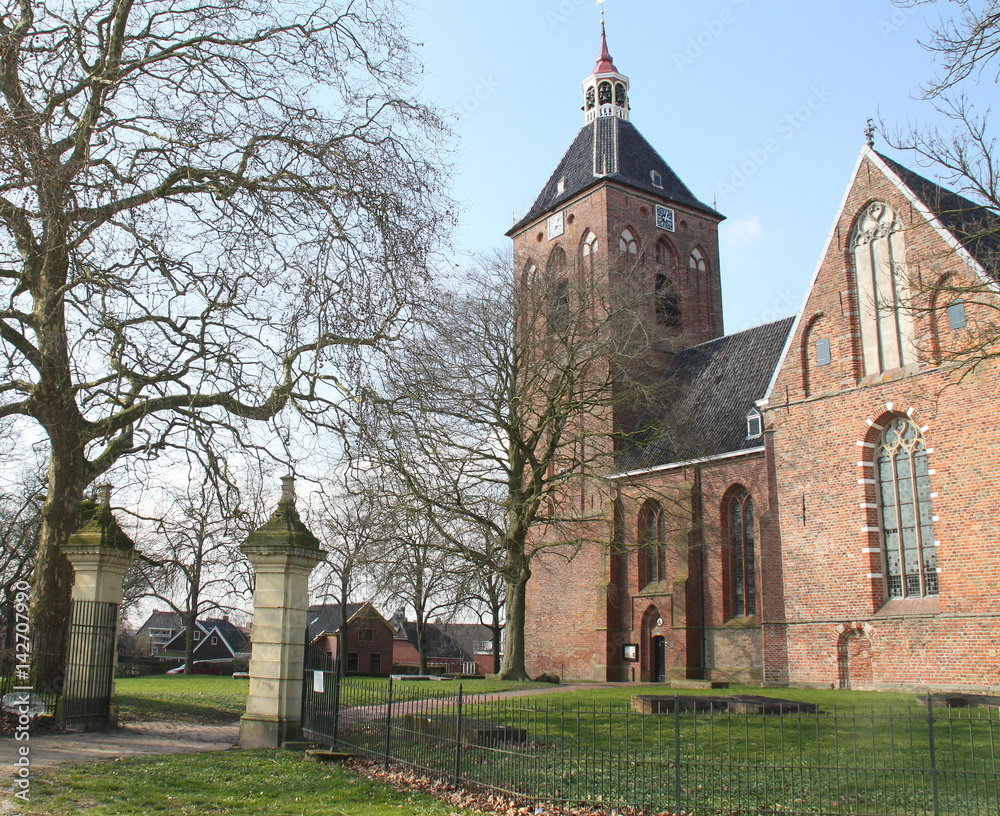 Hippolytus Church and entrance from the 15th century in Middelstum. The Netherlands