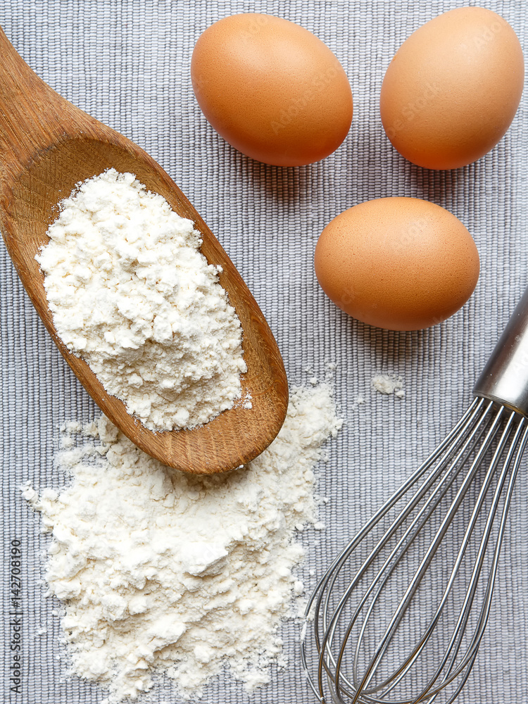 Chicken rind eggs, flour, ingredients and props shape and corolla for cooking homemade baking flat lay Chicken rind eggs, flour, ingredients and props shape and corolla for cooking homemade baking flat lay