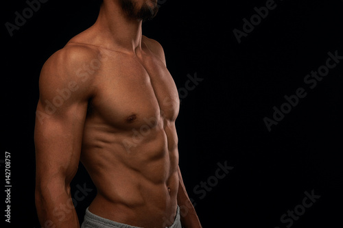 Male with muscular torso