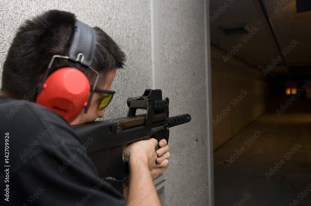 Man pointing a gun.