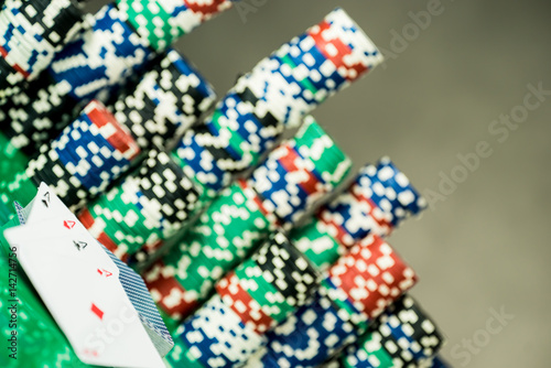 Poker Chips on a gaming table roulette Casino theme background