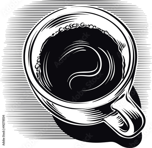 Cup of steaming coffee.