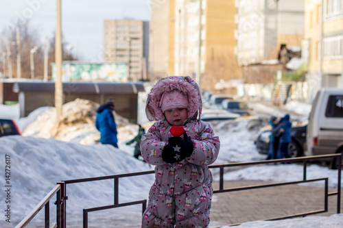 Little children on a walk in the playground