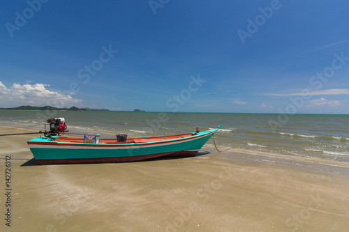 Fishing boat on Sam Roi Yot beach, Prachuap Khiri Khan, Thailand.
