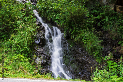 Waterfall on mountain river in Carpathian Mountains   Romania