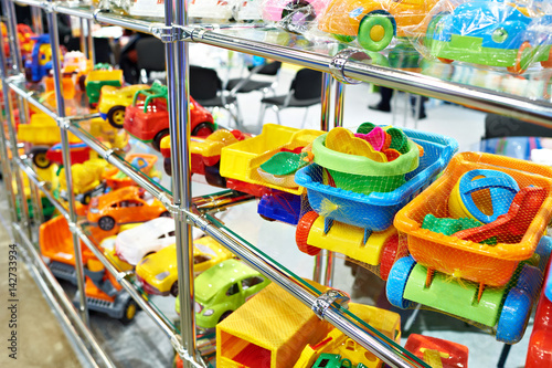 Toy colored plastic cars in children's store