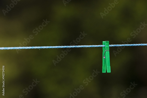 Clothes pin isolated on rope