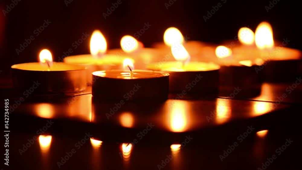 Burning candles. Candles light background. Candle flame at night. Burning candles. Candles light background. Candle flame at night.