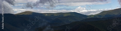 Panoramic view of Carpathian Mountains in a cold summer day    Romania
