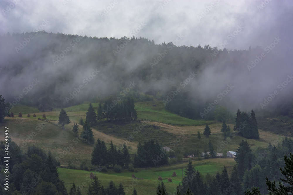 Moist spreading over Arieseni village in Romania, Apuseni Mountains