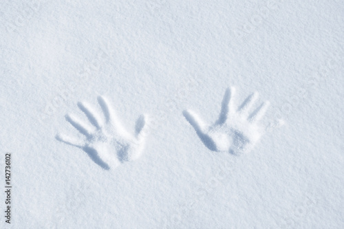 Handprints in the snow