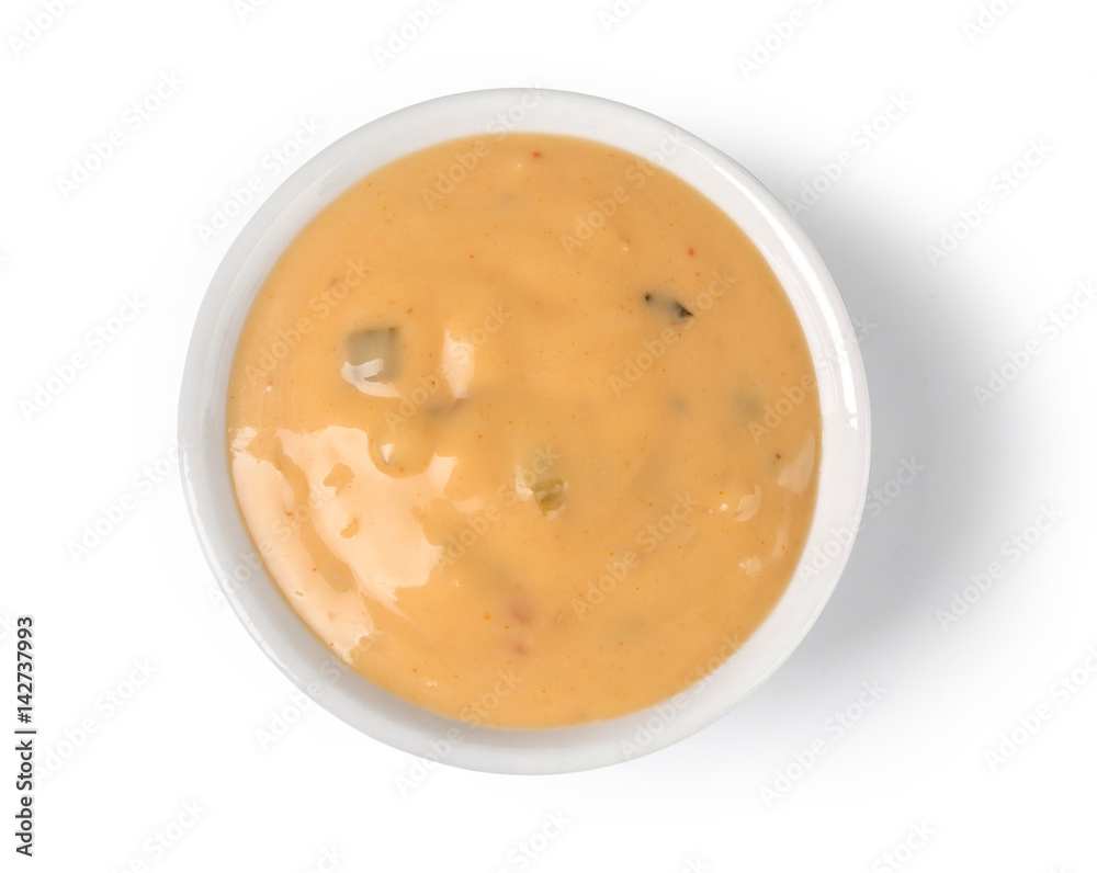 close up of a bowl of cheese sauce close up of a bowl of cheese sauce