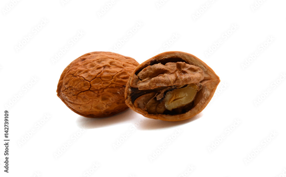 Cracked walnuts isolated on white background Cracked walnuts isolated on white background