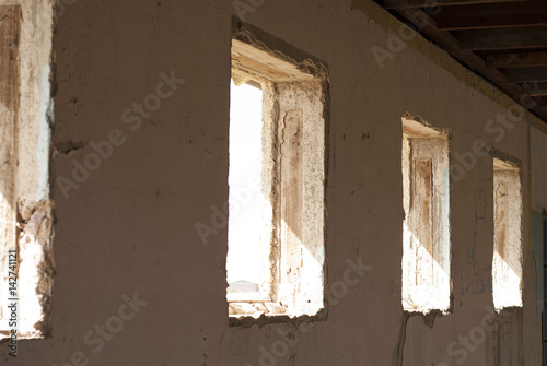 Row of windows in an abandoned building