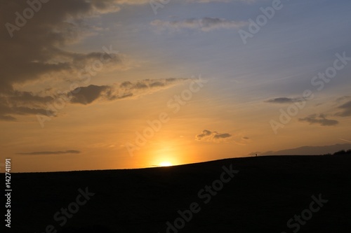 Sunset on meadow with hills and tree. Slovakia